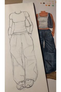 a drawing of a woman's top and pants next to a piece of paper