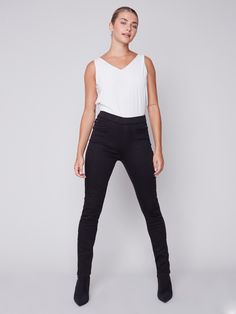 Description Build your favourite looks this season with this stretchy pull-on pant as a base. They look like jeans and behave like leggings, making your style appear effortless and fun. Try wearing these with a blouse, a sweater or a cardigan. Available in two must-have shades. Boost your comfort and style options with this pull-on pant in Black. Pull-on style Regular rise Skinny fit Stretchy twill Why we love it Pull-on pants with a little stretch in them come in handy any time of the year. The Funnel Neck Sweater, Twill Pants, Fit Pants, Pull On Pants, Fashion Updates, Fall Looks, Black Skinnies, Time Of The Year, Classic Looks