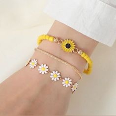 All Three Bracelets Are 18-23cm/7-9 Inches Sku:E170 #Bohemian #Jewelryset #Vacay #Trending #Daisies Handmade Trendy Yellow Friendship Bracelets, Handmade Trendy Yellow Bracelets, Trendy Handmade Yellow Bracelets, Gold Bohemian Beaded Bracelets For Spring, Yellow Bohemian Flower Bracelets, Casual Gold Friendship Bracelets For Spring, Casual Yellow Jewelry With Colorful Beads, Yellow Flower Bracelets For The Beach, Yellow Flower Bracelets For Beach