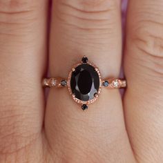 Like something from a magical land, this unique vintage-inspired Black Spinel ring, goes by the name of Amelia. It is a perfect ring for anyone looking for a special and breathtaking ring and who loves delicate jewelry that still wows you. Details: Center Gemstone: Black Spinel Stone Shape: Oval Measurements: approx. 9 Engagement Ring Black Diamond, Engagement Ring Black, Spinel Stone, Planet Ring, Spinel Jewelry, Black Spinel Ring, Black Diamond Engagement Ring, Black Stone Ring, Oval Engagement Ring