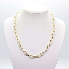 The White and Gold Chain Necklace is a sophisticated piece of jewelry, featuring alternating links of elegant white and shimmering gold. This combination creates a timeless and versatile accessory, suitable for both casual and formal attire. Formal Attire, Gold Chain Necklace, Tennis Bracelet, Rainbow Colors, Gold Chain, Gold Chains, The White, Chain Necklace, Gemstones