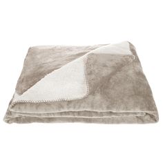 a blanket that is laying on top of a white surface with a gray and white color scheme