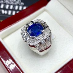 BRAND-NEW!! ONE OF A KIND, HANDCRAFTED RING. EXQUISITE AND FINE CRAFTSMANSHIP! HANDMADE TO LAST FOR AN ETERNITY!! HEIRLOOM PIECE!! PRECIOUS JEWELRY TO BE PASSED ON! PERFECT DRESS RING FOR A GENTLEMAN! 4.63 total carat weight, Certified, Natural blue sapphire ring. This ring offers an important statement of who you are with a 3.21 carats, VIVID BLUE, transparent, CEYLON BLUE SAPPHIRE. Accentuating the BLUE SAPPHIRE are the 46 F/VS, sparkling natural diamonds SUGGESTED RETAIL VALUE: $10,500   BLUE Luxury Sapphire Diamond Ring With Diamond Cut, Luxury Sapphire-colored Diamond Ring, Luxury Sapphire-colored Diamond Ring With Diamond Cut, Luxury 14k White Gold Signet Ring, Luxury Platinum Sapphire Ring With Vvs Clarity, Luxury Sapphire Diamond Ring With Center Stone, Luxury White Gold Sapphire Ring With Vvs Clarity, Luxury Sapphire Ring In Platinum With Vvs Clarity, Luxury Gia Certified Baguette Cut Sapphire Ring