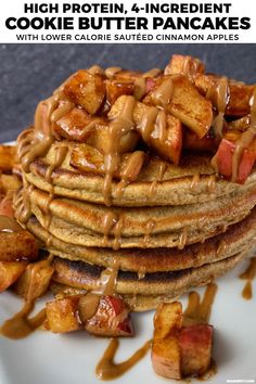 a stack of pancakes with caramel syrup drizzled over them on a white plate