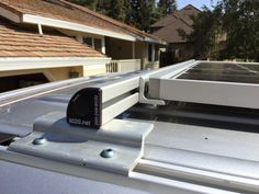 a solar panel on the roof of a house