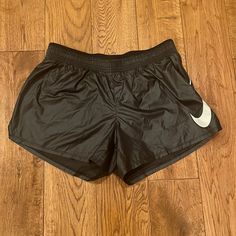 Nwt!! Cute Shiny Black Shorts With Nike Sign On The Side Cheap Nike Black Athletic Shorts, White Nike Pros, Womens Running Shorts, Shiny Shorts, Nike Sign, Grey Nike Shorts, Teal Nikes, Nike Signs, Black Nike Shorts