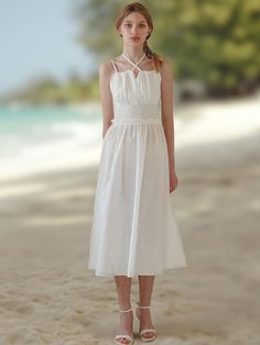 This is a romantic and unique dress by HYBERNAT that is made out of high quality and sturdy fabric. With trendy design detail and minimal feminine mood, you can style it for your daily refined outfit.- Frill detail on the waist and halter neckline- Elastic waistband detail- Adjustable shoulder straps Elegant Beach Halter Dress With Smocked Back, Elegant Beach Halter Dress With Gathered Neckline, Summer Halter Neck Midi Dress With Gathered Neckline, Elegant Summer Halter Dress With Ruched Bodice, Elegant Halter Neck Midi Dress For Daywear, Elegant Midi Dress With Elastic Neckline For Daywear, Elegant Summer Midi Dress With Gathered Neckline, Elegant Summer Halter Dress With Smocked Back, Elegant Sundress For Daywear