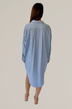 this oversize, blue and white striped button down shirtdress is going to be your new go-to closet staple. can be worn casually everyday with a pair of sandals or sneakers, or can be dressed up with a belt and strappy heels. the styling choices are endless with this one. 70% rayon | 30% polyester hand wash cold | hang dry | cool iron do not dry clean models are wearing a size small all sale items are final sale Oversized Blue Shirt Dress For Summer, Striped Relaxed Fit Shirt Dress For Summer, Oversized Blue Button-up Shirt Dress, Oversized Button-up Blue Shirt Dress, Summer Long Sleeve Shirt Dress With Vertical Stripes, Oversized Blue Shirt Dress For Beach, Oversized Blue Shirt Dress For Day Out, Oversized Blue Shirt Dress For Workwear, Casual Oversized Striped Shirt Dress