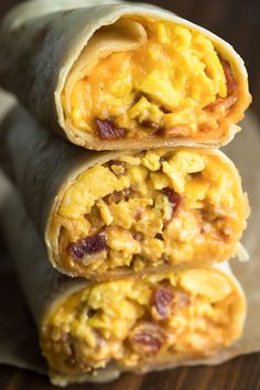 two breakfast burritos stacked on top of each other