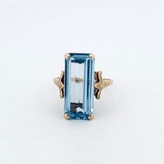 "Vintage Estate 14k Yellow Gold Large Rectangle Blue Spinel Statement Ring, Size 7.5, 6.2g" Description: "Make A Bold Statement With This Exquisite Vintage Estate Piece - A 14k Yellow Gold Large Rectangle Blue Spinel Statement Ring, Sized Perfectly At 7.5. Crafted With Impeccable Attention To Detail, This Stunning Ring Features A Striking Blue Spinel Stone Securely Held In Place By Four Prongs, Radiating Elegance And Sophistication. The Hallmark May Be Worn, But Rest Assured, We've Conducted Tho 14k Gold Art Deco Topaz Ring For Formal Occasions, Art Deco 14k Gold Topaz Ring For Formal Occasions, Rectangular Topaz Ring 14k Gold For Gifts, Rectangular Topaz Ring In 14k Gold, 14k Gold Rectangular Topaz Ring For Gift, Blue 14k Gold Jewelry With Rectangular Stone, Elegant Rectangular Topaz Ring In 14k Gold, Elegant 14k Gold Rectangular Topaz Ring, 14k Gold Jewelry With Blue Rectangular Stone