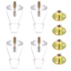 six clear glass cup holders with screws on each side and two brass plated bases