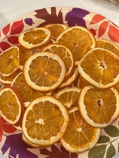 an orange cut in half on a plate