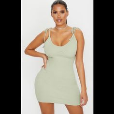 Bnwot Prettylittlething Shape Sage Green Thick Rib Tie Shoulder Underbust Bodycon Mini Dress In A Size 4 Sold Out. Bodycon Mini Dress For Brunch, Cotton Bodycon Mini Dress, Cotton Bodycon Mini Dress For Date Night, Cotton Bodycon Dress For Day Out, Casual Mini Bodycon Dress For Date Night, Green Bodycon Dress For Brunch, Mini Length Bodycon Dress For Brunch, Trendy Mini Bodycon Dress For Brunch, Trendy Mini Cotton Bodycon Dress