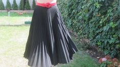 "This pretty skirt vintage is perfect for spring, autumn and summer! DETAILS: pleated skirt circle skirt color: black fabric: polyester side zipper Excellent condition. Measurements lying flat are: Length: 27,5\" / 69,8cm Waist: 13\" / 33 cm  Hips: full PLEASE NOTE: \"Laying flat\" means that waist NEED TO DOUBLED Estimated size: EUR38 / UK10, but refer to measurement. Belt and blouse in photo are not included." Black A-line Retro Skirt, Black Retro A-line Skirt, Spring Vintage Fashion Pleated Skirt, Retro Pleated Spring Skirt, Retro Pleated Flared Skirt For Summer, Retro Summer Pleated Midi Skirt, Vintage Formal Skirt For Summer, Vintage Fashion Full Skirt For Spring, Retro Summer Pleated Skirt