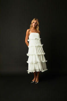 This Pleated Tiered Long Dress is a must-have for your wardrobe! Crafted from lightweight and breezy pleated fabric this dress features adjustable spaghetti straps for the perfect fit and delightful lettuce hems that really make this piece stand out. The tiers create an elegant silhouette and the design pairs perfectly with sandals for a timeless look. Spring Tiered Dress With Adjustable Spaghetti Straps, Spring Tiered Spaghetti Strap Dress With Adjustable Straps, Spring Elegant Tiered Dress With Spaghetti Straps, Spring Pleated Tiered Dress, Elegant Spring Tiered Dress With Spaghetti Straps, Flowy Tiered Spaghetti Strap Dress With Ruffles, Elegant Tiered Dress With Spaghetti Straps And Ruffle Hem, Elegant Tiered Spaghetti Strap Dress For Spring, Spring Tiered Dress With Adjustable Straps