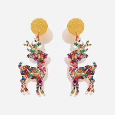 This holiday season, let our Christmas Reindeer Earrings add a touch of whimsy and wonder to your outfit. These lightweight earrings would pair nicely with your tacky Christmas sweater look. Add them to your look with leggings or jeans and some monogrammed boots to complete the perfect holiday look.Made of resin with surgical stainless steel postEach earring has its own unique character, so no two earrings will be exactly the same.Each earring is approximately 2 inches long and 1 inch wide.Pleas Tacky Christmas Sweater, Tacky Christmas, Marley Lilly, Lightweight Earrings, Holiday Looks, Light Weight Earrings, Holly Jolly, Christmas Reindeer, Christmas Sweater