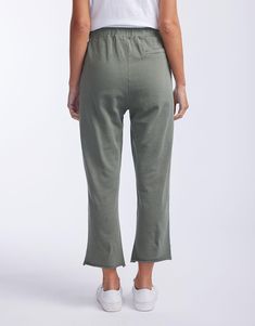 DESCRIPTION Ultra comfortable and oh-so-stylish, you'll love the Raw Edge Lounge Pant from White & Co. Crafted from super soft un-brushed French Terry, these lounge pants are an everyday must-have! These stylish pants feature an elastic waistband, relaxed straight-leg silhouette, front patch pockets and back jet pockets. Considered details like the matching drawcord, top stitch detail colour pop bar tack and raw finished hem elevate these weekend essentials. Still browsing? Discover our full ran Super Soft Comfortable Bottoms For Leisure, Comfortable Super Soft Bottoms For Leisure, Green Straight Leg Loungewear Bottoms, Green Straight Leg Bottoms For Loungewear, Comfortable Green Bottoms With Relaxed Fit, Comfortable Green Bottoms With Side Pockets, Relaxed Solid Color Bottoms For Loungewear, Super Soft Relaxed Fit Athleisure Bottoms, Casual Wide Leg Soft-washed Bottoms