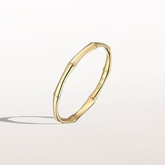 The Minimalist Bamboo Ring is a great integration natural and modern style. The glittering stones increase its brilliance. It is perfect for everyday wear and wonderful gift for all kind of occasions. - Made in 14k solid gold- Band Width: 1.65mm / 0.06 inches- Thickness: 1.11 mm / 0.04 inches -This product comes with iconic Norm Jewels gift box Minimalist Stackable Midi Rings For Formal Occasions, Minimalist Yellow Gold Midi Rings For Formal Occasions, Minimalist Formal Stackable Midi Rings, Minimalist Yellow Gold Round Band Bracelet, Minimalist Yellow Gold Midi Rings With Simple Design, Minimalist Simple Yellow Gold Midi Rings, Minimalist Yellow Gold Midi Rings, Minimalist 14k Yellow Gold Midi Rings, Minimalist 14k Gold Open Ring Bracelets