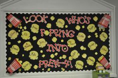 a bulletin board with popcorn on it and words that say, look who's spring into prek - k