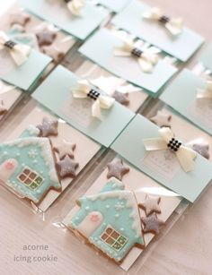 some cookies in the shape of houses and stars