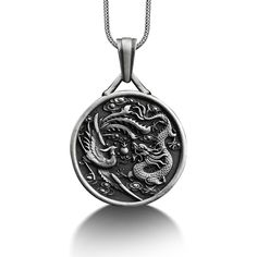 Phoenix and Dragon Engraved Necklace, Sterling Silver Personalized Necklace, Dragon Phoenix Jewelry, Customizable Necklace, Memorial Gift These 925K Sterling Silver Phoenix and Dragon Engraved Necklace photos are taken with original and every item has handmade engraving details. It's very elegant and classy for everyday use but also can be preferred as a gift for friends and family for an eternal memorial. We prepared a new collection for your loved ones, and a gift selection from BySilverStone Collectible Round Coin Pendant Jewelry, Antique White Gold Round Necklace, Antique Round White Gold Necklace, Symbolic Silver Coin Necklace, Silver Symbolic Coin Necklaces, Silver Coin Necklaces With Symbolic Style, Silver Engraved Symbolic Coin Necklace, Antique Silver Symbolic Jewelry With Large Pendant, Silver Medallion Necklace In Symbolic Style