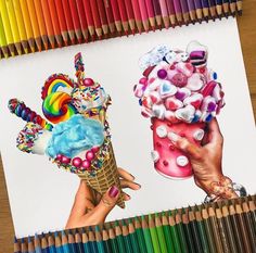 a drawing of two ice cream cones with colorful toppings