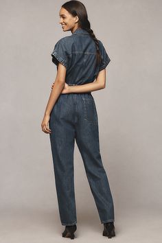 Denim, decoded: We’re digging denim in every corner of our closet. This one-piece wonder by Ética features a notched shirt collar, matching belt, and oversized pockets. | Megg Utility Belted Denim Jumpsuit by Ética in Blue, Women's, Size: XL, Cotton/Tencel at Anthropologie Chic Dark Wash Denim Jumpsuit With Relaxed Fit, Chic Dark Wash Relaxed Fit Denim Jumpsuit, Casual Denim Jumpsuit With Belt Loops For Work, Denim Jumpsuit With Belt Loops For Workwear In Spring, Denim Jumpsuit For Work With Belt Loops, Spring Denim Jumpsuit For Work With Belt Loops, Spring Denim Jumpsuit With Belt Loops For Work, Denim Blue Relaxed Fit Jumpsuits For Workwear, Relaxed Fit Denim Blue Jumpsuits For Work