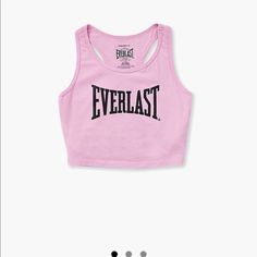 Everlasting Forever 21 Collab Brand New Forever 21 Girls - A Knit Tank Top Featuring A Front Everlast Logo Graphic, Scoop Neck, Racerback, Shoulder Straps, And A Cropped Hem. - Officially Licensed Product Content + Care - Shell & Other Contents: 95% Cotton, 5% Spandex - Machine Wash Cold Size + Fit - Measured From A Size 7/8 - Full Length: 12.25" - Chest: 24.25" Cute Pink Forever 21 Top, Forever 21 Cotton Stretch Tank Top, Forever 21 Fitted Pink Tops, Fitted Pink Tops By Forever 21, Pink Graphic Print Racerback Top, Pink Cotton Forever 21 Tops, Forever 21 Pink Cotton Top, Trendy Stretch Tops For Playwear, Cute Cotton Top By Forever 21