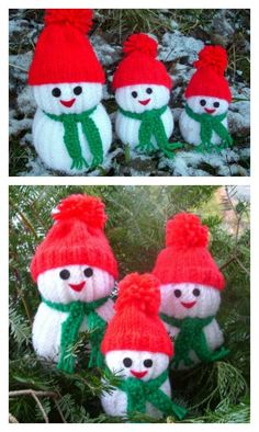 four snowmen in hats and scarves are hanging from a christmas tree with pine needles