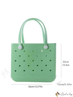 a green tote bag with holes on the side and handles, measurements for each