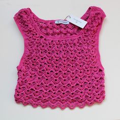 Pink crochet crop top delicate unique design Available in UK 8 to buy now. See below on how to preorder if you would like a different size: We're a UK brand that specialise in handmade clothing. All our items are created by Anne Lee, with help from Amy. Our styles reflect hippie/bohemian fashion and we like to mix bright colours and patterns to create one of a kind items.  Every item is slightly different and unique, all handmade personally for you with love. This means we only sell in limited quantities and not every size/style is listed. If you are interested in an item and would like to pre-order this in your size, please send us a message. Please check out our other items x Summer Cropped Crochet Lace Top, Knitted Cropped Crop Top For Summer, Spring Crochet Crop Top, Fitted Cropped Crochet Top, Spring Knitted Crop Top, Summer Cropped Open Knit Crop Top, Spring Pink Crochet Crop Top, Pink Fitted Cropped Crochet Top, Pink Fitted Crochet Crop Top