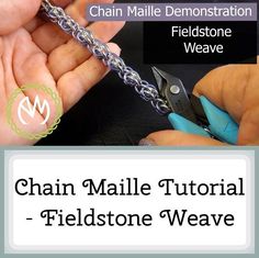 the chain maille is being held by someone using scissors