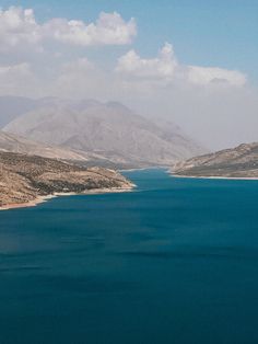 a large body of water surrounded by mountains