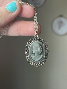 Embrace the timeless beauty of vintage fashion with this exquisite Cameo Necklace, a piece of costume jewelry that captures the elegance and charm of a bygone era. This stunning necklace features a classic cameo pendant, showcasing the traditional profile of a delicate figure in relief, set against a contrasting background that highlights its intricate details. Cameos have been treasured for centuries as symbols of refinement and sophistication. They often depict portraits, mythological scenes, Vintage Cameo Jewelry, Jewelry Victorian, Cameo Pendant Necklace, Cameo Jewelry, Vintage Cameo, Cameo Necklace, Bygone Era, Retro Jewelry, Cameo Pendant