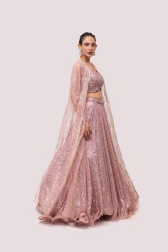 Look your best on wedding occasions in this light pink lehenga with intricate pearl, cut dana, and sequence work. Dazzle on weddings and special occasions with exquisite Indian designer dresses, sharara suits, Anarkali suits, bridal lehengas, and sharara suits from Pure Elegance Indian clothing store in the USA. Shop online from Pure Elegance. Disclaimer: The actual product may vary slightly from the image. These are custom orders, hence expect slight variation in color, placement of the motif or buta. ESTIMATED DELIVERYBecause this is a custom order, it would take about 4 weeks from the date of purchase. RETURN POLICYThis product is a custom order and cannot be returned or exchanged. Luxury Pink Organza Lehenga, Light Pink Sharara, Pink Embellished Semi-stitched Sharara, Pink Embellished Organza Lehenga, Pink Embroidered Organza Sharara, Sharara Suits, Organza Lehenga, Pink Lehenga, Fashion Journals