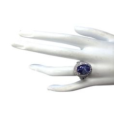 Stamped: 14K White GoldTotal Ring Weight: 11.0 GramsRing Length: N/ARing Width: N/AGemstone Weight: Total Natural Tanzanite Weight is 8.65 Carat (Measures: 12.85x9.62 mm)Color: BlueDiamond Weight: Total Natural Diamond Weight is 1.20 CaratColor: F-G, Clarity: VS2-SI1Face Measures: 18.50x16.03 mmSku: [702408W] Blue Round Tanzanite Jewelry, Silver Tanzanite Luxury Diamond Ring, Exquisite Blue Tanzanite Ring, Brilliant Cut Tanzanite Gemstones, Brilliant Cut Blue Tanzanite Gemstones, 14k White Gold Diamond Ring, Tanzanite Diamond Ring, Blue Tanzanite, Natural Tanzanite