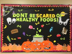 a bulletin board that says don't be scared of healthy foods