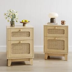 two wooden side tables with wicker drawers