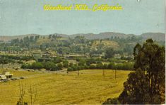 an old postcard shows the view of santa barbara hills, californa