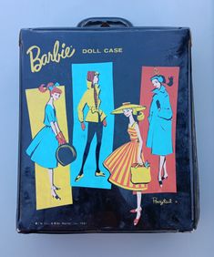 an old fashion doll case with two women in dresses and hats on the front cover