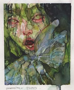 a watercolor painting of a woman's face with green leaves around her neck