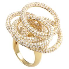 A whirlwind of diamonds take center stage in the design of this lavish cocktail ring. The ring is made of 18K yellow gold and features overlapping circle motifs set with diamonds. Circle Diamond, Circle Ring, Center Stage, The Ring, Diamond Cluster, Cocktail Ring, Cocktail Rings, Rose Gold Ring, Pretty Things