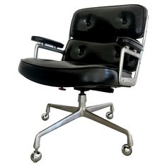 an office chair with wheels and black leather upholstered on the back, against a white background