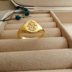 a gold ring sitting on top of some steps