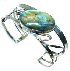 Handmade Unique 925 Sterling Silver bracelet with unique one of a kind Labradorite,  28.90 grams of marvelous handcrafted jewelry design. Only one piece availble ready to ship! It's unique worldwide bracelet - simply piece of art in world of fine jewelry. Beautiful Modern Shimmering Labradorite .925 Sterling Silver Bracelet / Cuff  BRACELET DETAILS: Weight: 28.90g; Material: Sterling Silver; Main stone: Labradorite; Width (widest section): 7/8 inch wide; Inner circumference: 7-9 inch; Stamp / Ma Sterling Silver Bracelets Gift, Unique Handmade Oval Cuff Bracelet, Silver Untreated Cuff Bracelet Gift, Sterling Silver Oval Cuff Bracelet, Silver Bracelet Cuff, Silversmithing Jewelry, Gemstone Cuff Bracelet, Pendant Making, Unique Silver Jewelry