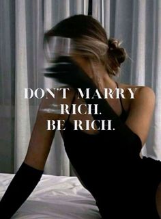 a woman sitting on top of a bed with her legs crossed and the words don't marry rich be rich