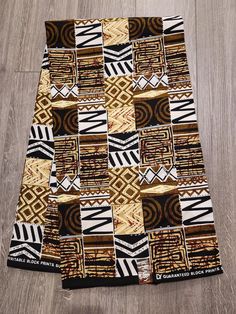 African Ankara Print Fabric. This is fabric is sold by the fold and each fold is approximately a yard.  This fabric is 100% cotton and has a width of 44in.  It can be used make different clothing, quilting and other sewing projects. Purchases of more than a yard, it will come in a continuous piece We ship via USPS First Class Mail, USPS Priority mail or UPS Traditional Brown Cotton Fabric, African Quilts, Clean And Press, Head Wrap Headband, Ankara Print, African Ankara, Fabric Headbands, Class Design, African Print Fabric