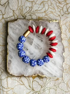 "Add this bracelet as a great accessory to all your patriotic celebrations! Made from recycled glass beads and Ashanti beads. Measures 7\" but can be made in a different size if requested." Labor Day Usa, Patriotic Bracelet, Funky Necklace, Patriotic Jewelry, Beaded Jewelry Bracelets, Usa Jewelry, Recycled Glass Bead, Jewelry Diy Bracelets, Beads Bracelet Design