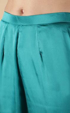 Easy breezy teal co-ord set made in satin fabric. This set is a go-to piece for when you wish to look effortless. Ideal to be worn for weekend gateways, formal events, lunches, and even evening galas.Tied knot style top Teal hued Tailored pantsSatin Fabric Tied Knot, Co Ords, Easy Breezy, Pakistani Outfits, Co Ord Set, Co Ord, Satin Fabric, Formal Event, To Look