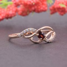 "Garnet ring, Rose gold ring, Promise ring gold, Dainty ring, Custom stone ring, Promise ring for her, Women garnet ring, Garnet promise ring WE OFFER UNLIMITED PERIOD INSTALLMENTS PLAN This is a beautiful, stunning, feminine ring that works well for all occasions, styles, and ages. You will love it! Ring information: Main stone: Garnet Approximate size: 3mm Approximate weight: 0.13ct Accent stone: Cubic zirconia Metal type: Gold Metal stamp: 14k Gold Customization / Replacements It's easy to cr Anniversary Garnet Ring, Elegant Rose Gold Ruby Ring For Promise, Elegant Rose Gold Ruby Promise Ring, Garnet Cluster Promise Ring In Fine Jewelry Style, Rose Gold 14k Topaz Promise Ring, Rose Gold Topaz Promise Ring In 14k Gold, Garnet Birthstone Promise Rings, Rose Gold Cluster Ring With Accent Stones For Promise, Rose Gold Open Ruby Ring For Promise